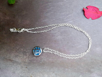 Silver Oriental Filigree Resin Reversable Pendant