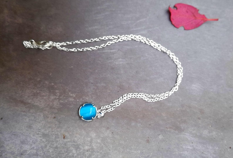 Silver Oriental Filigree Resin Reversable Pendant
