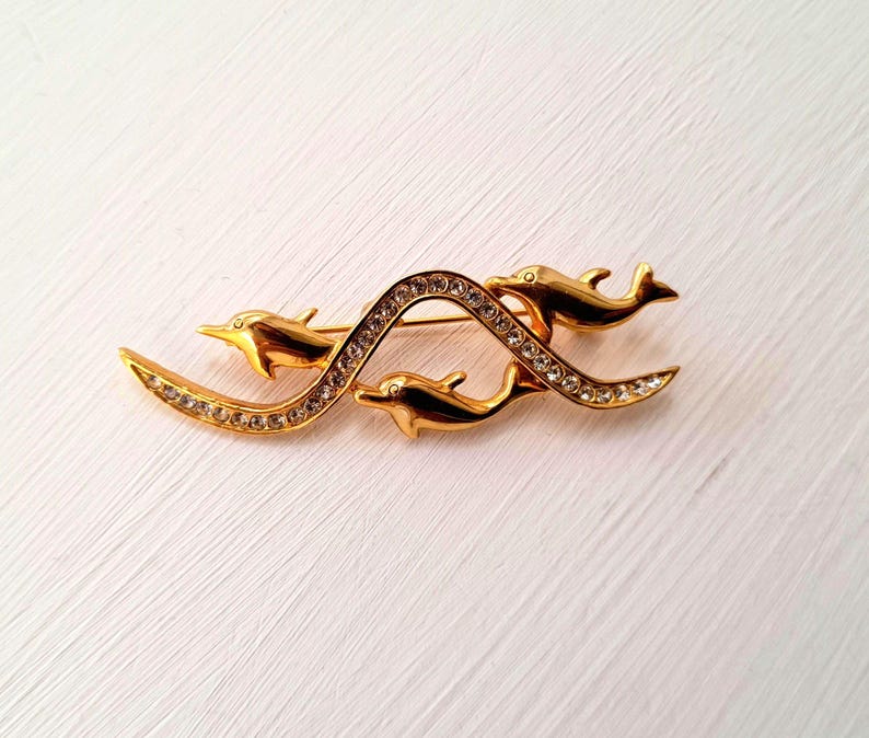 Dolphin Pod Waves Gold Rhinestone Vintage Brooch
