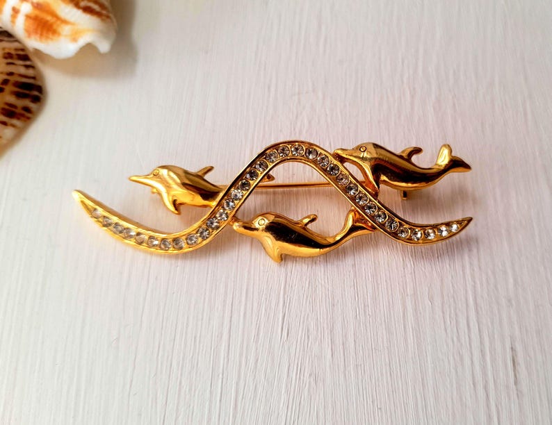 Dolphin Pod Waves Gold Rhinestone Vintage Brooch
